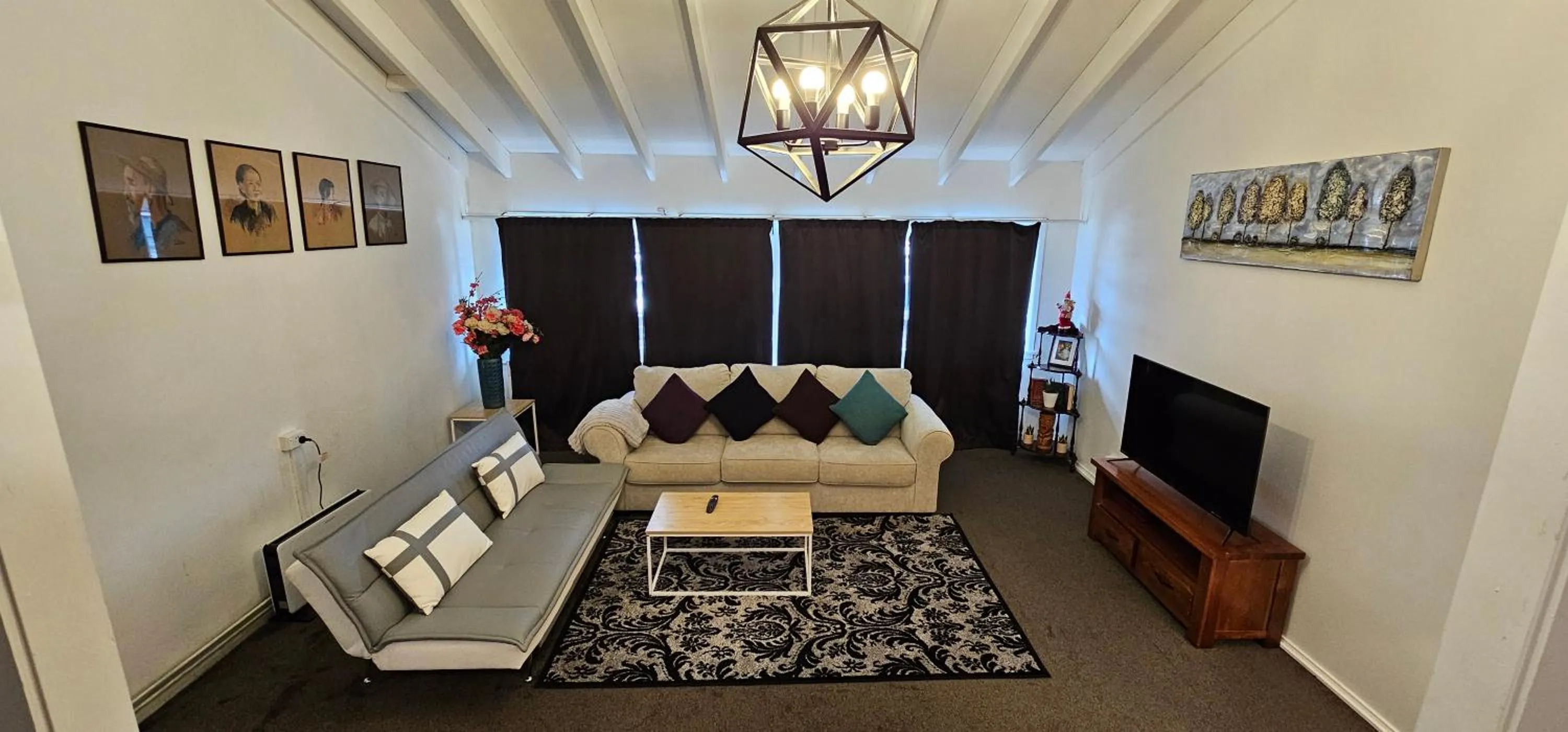 Communal lounge/ TV room in Kiwi As Guest House