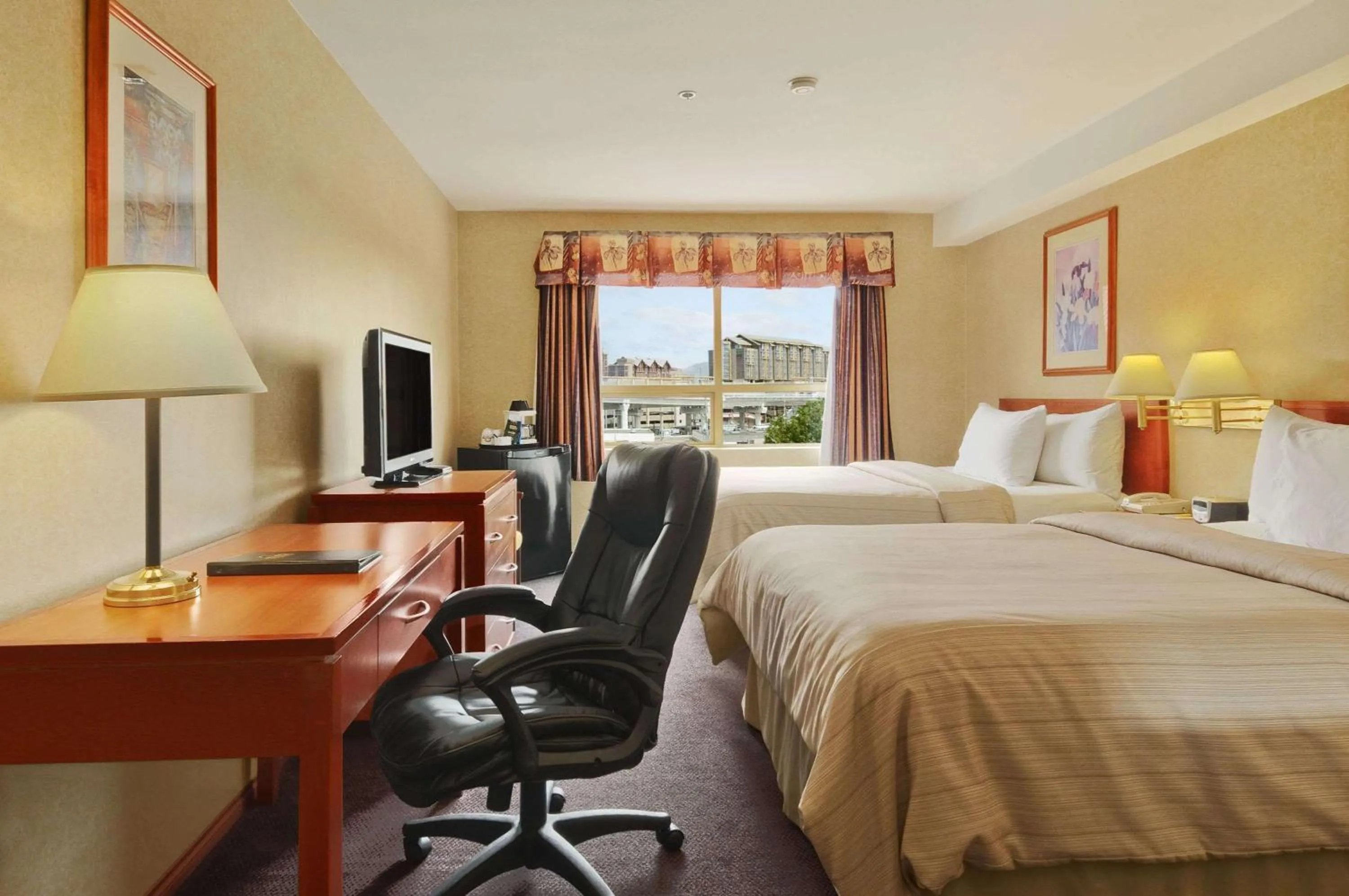 Photo of the whole room, Bed in Days Inn by Wyndham Vancouver Airport