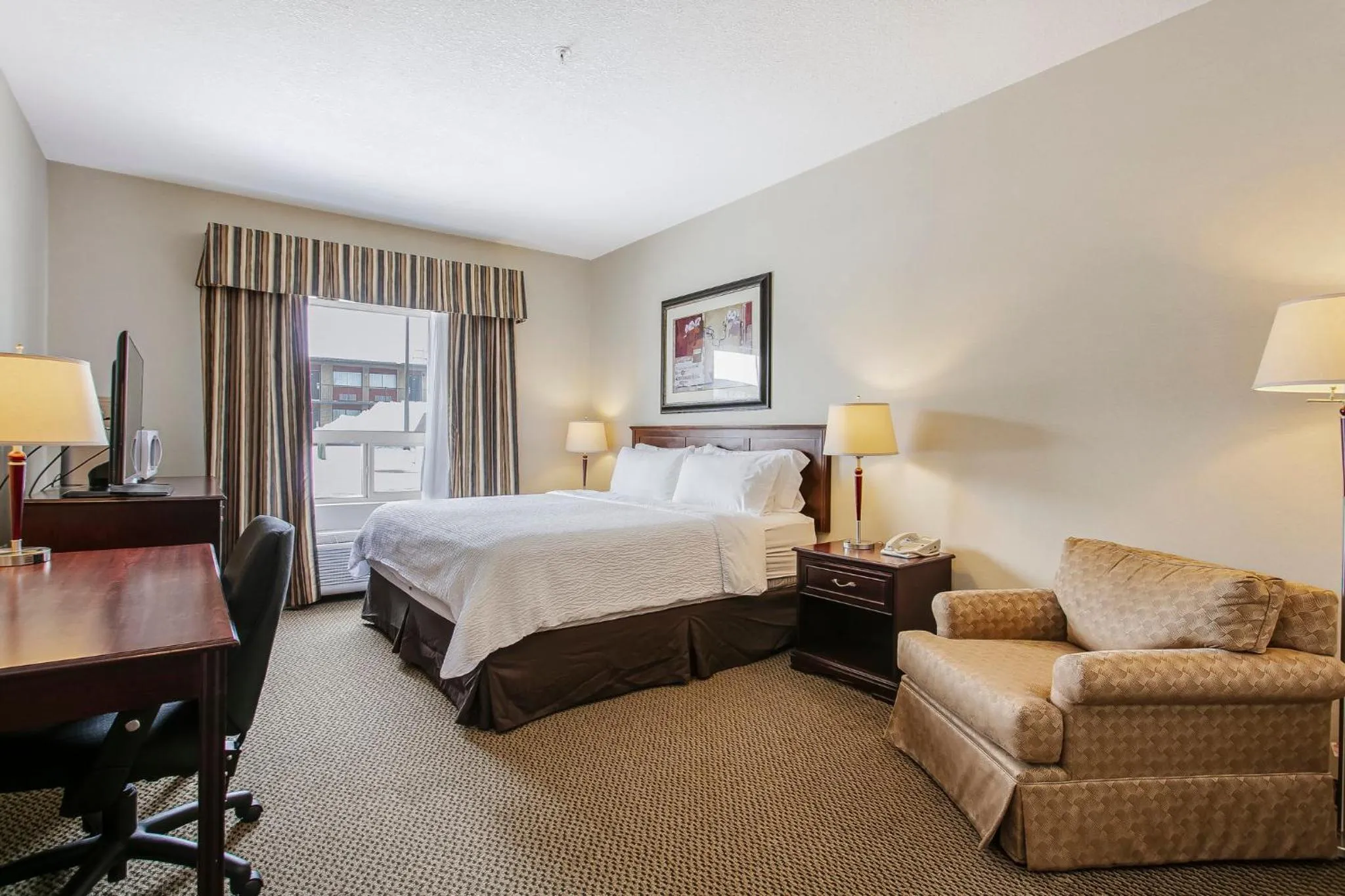 Photo of the whole room, Bed in Holiday Inn & Suites Lloydminster by IHG