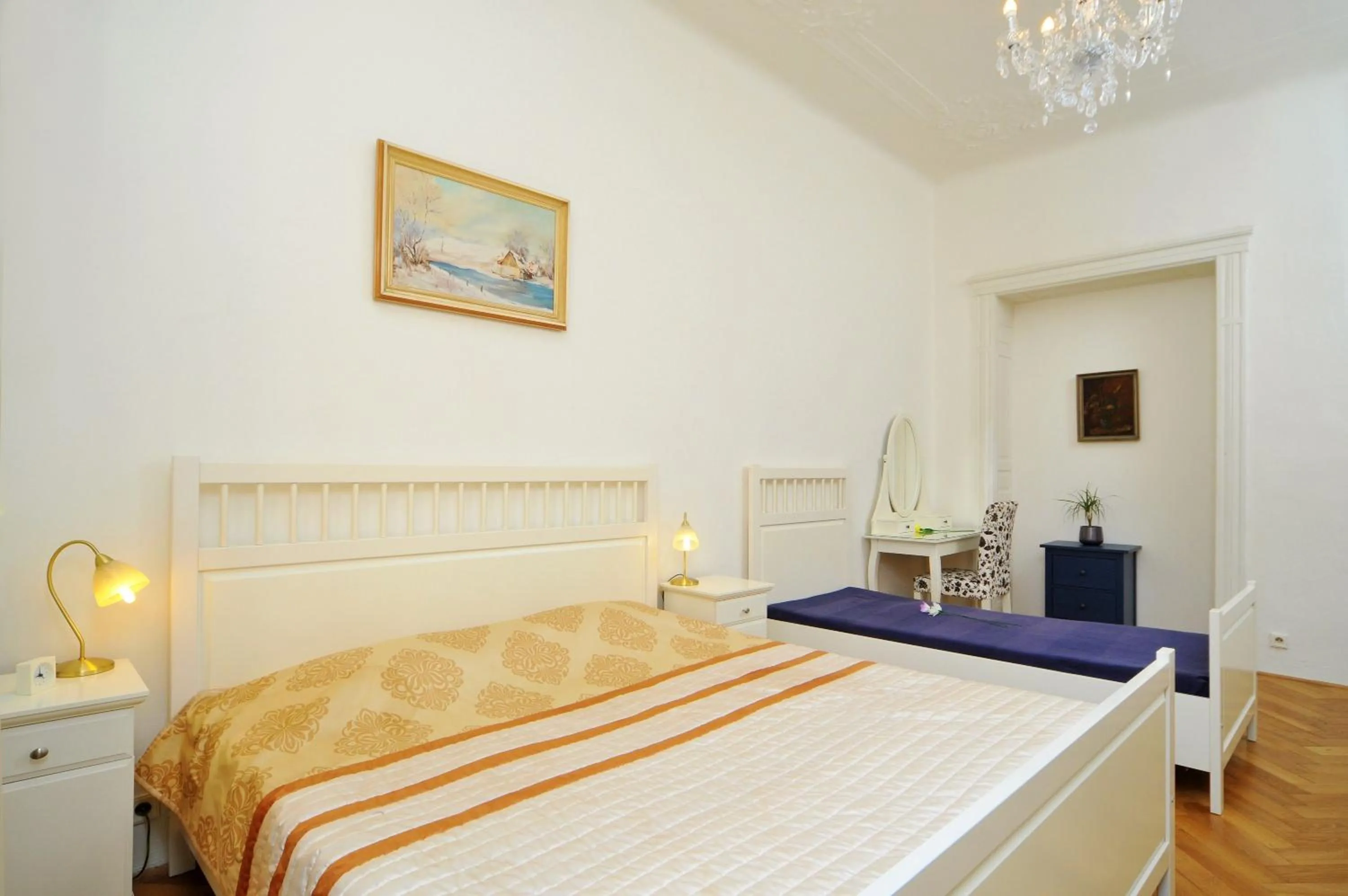 Bed in Old Town Square Apartments