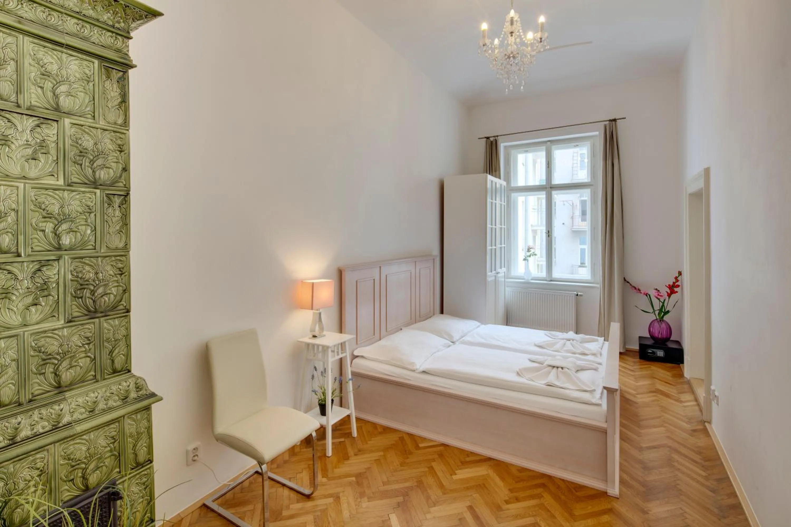 Bed in Old Town Square Apartments