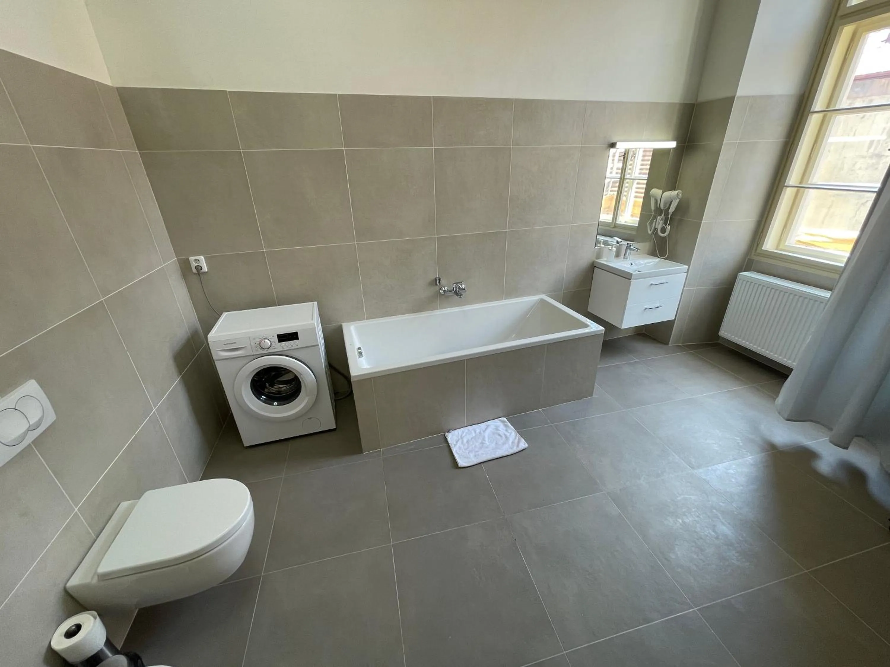 Toilet in Old Town Square Apartments