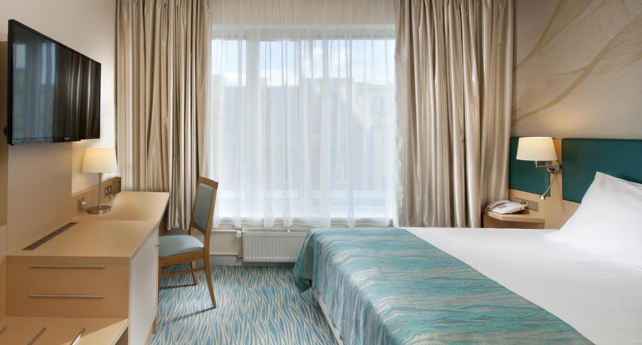 Photo of the whole room, Bed in Holiday Inn Prague by IHG