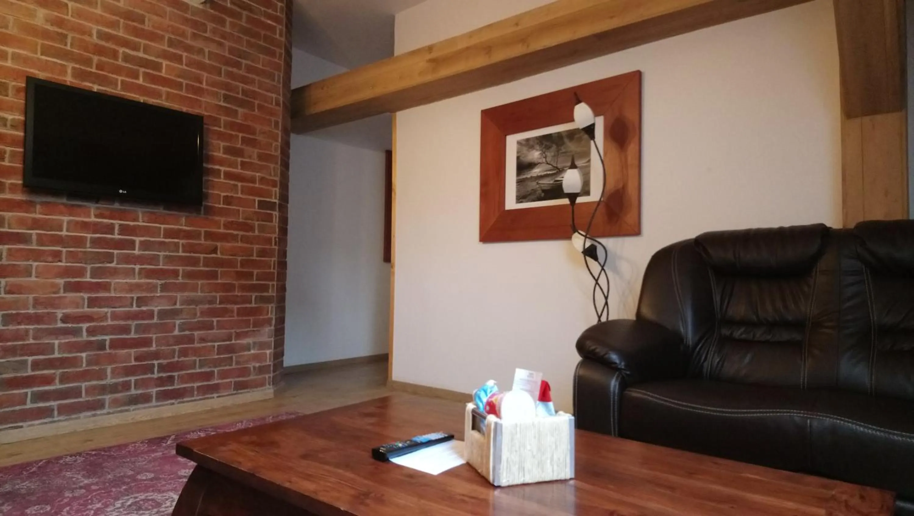 Seating area in Enjoy Inn