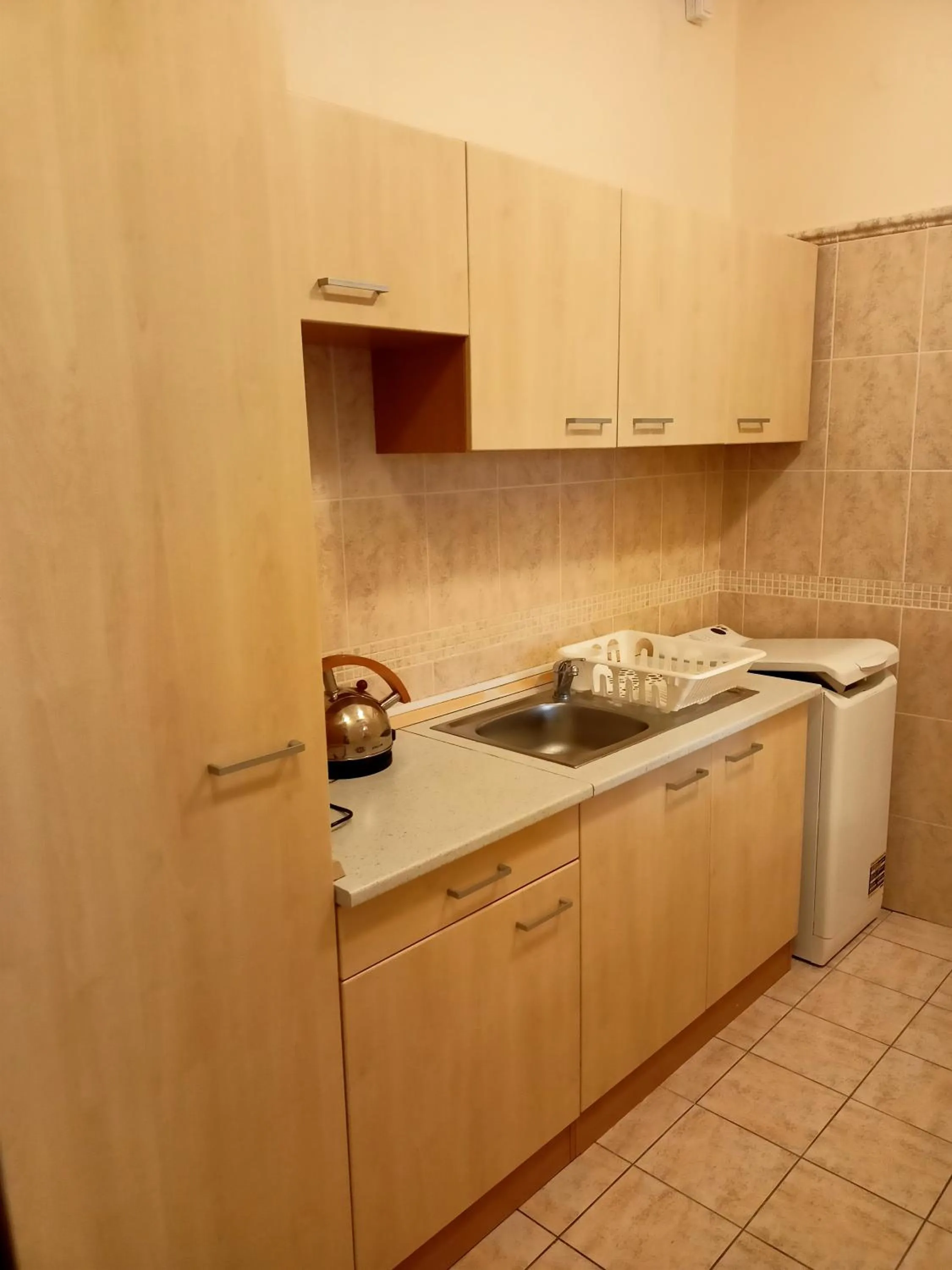 Kitchen or kitchenette in Enjoy Inn