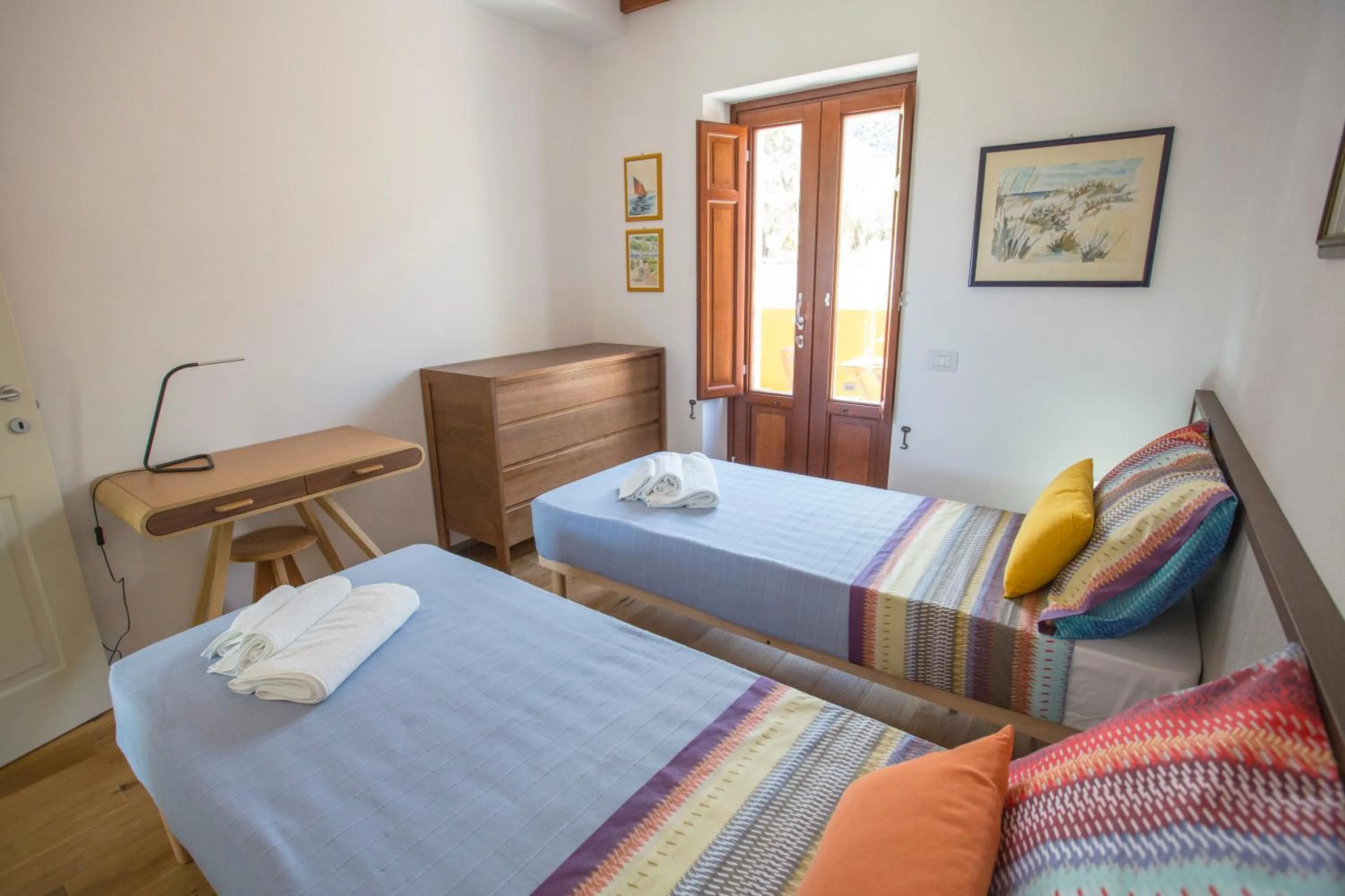Photo of the whole room, Bed in Il dono di Atena