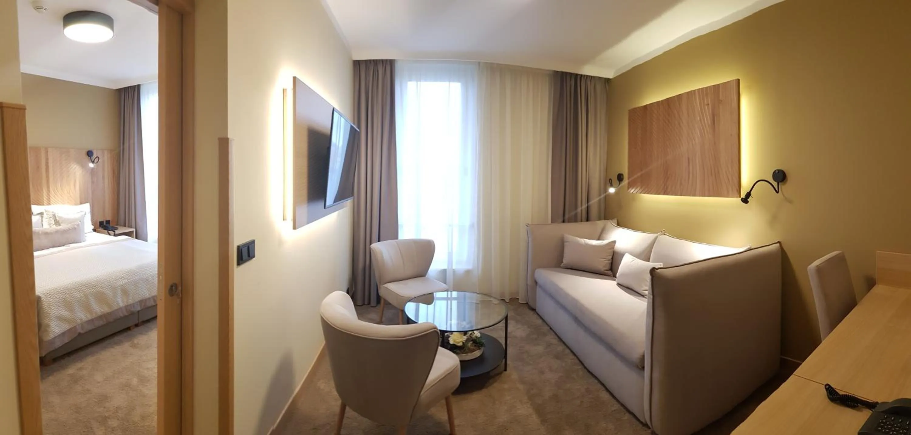 Living room, Bed in Hotel Clement