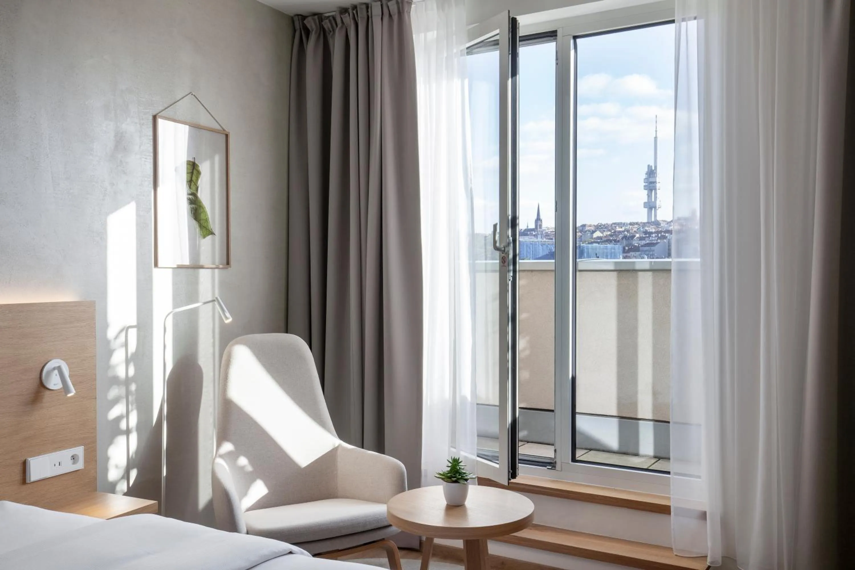 Seating area, Bed in Botanique Hotel Prague
