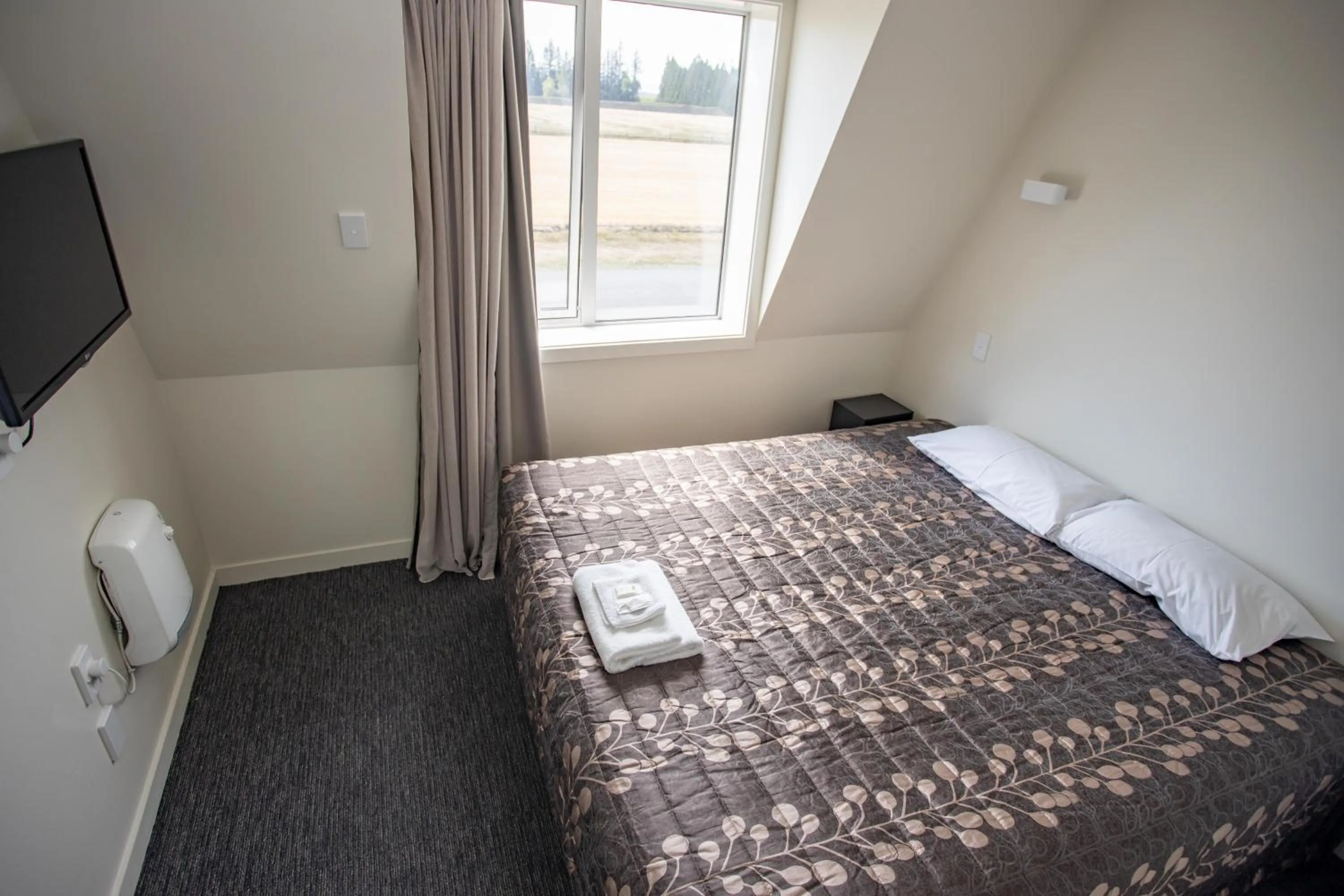Bed in Southern Cross Lodge Methven