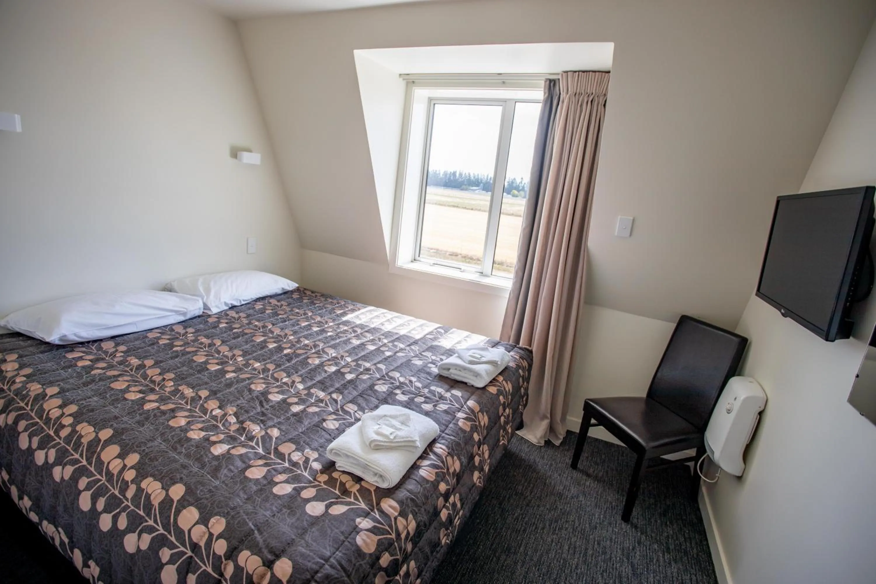 Bed in Southern Cross Lodge Methven