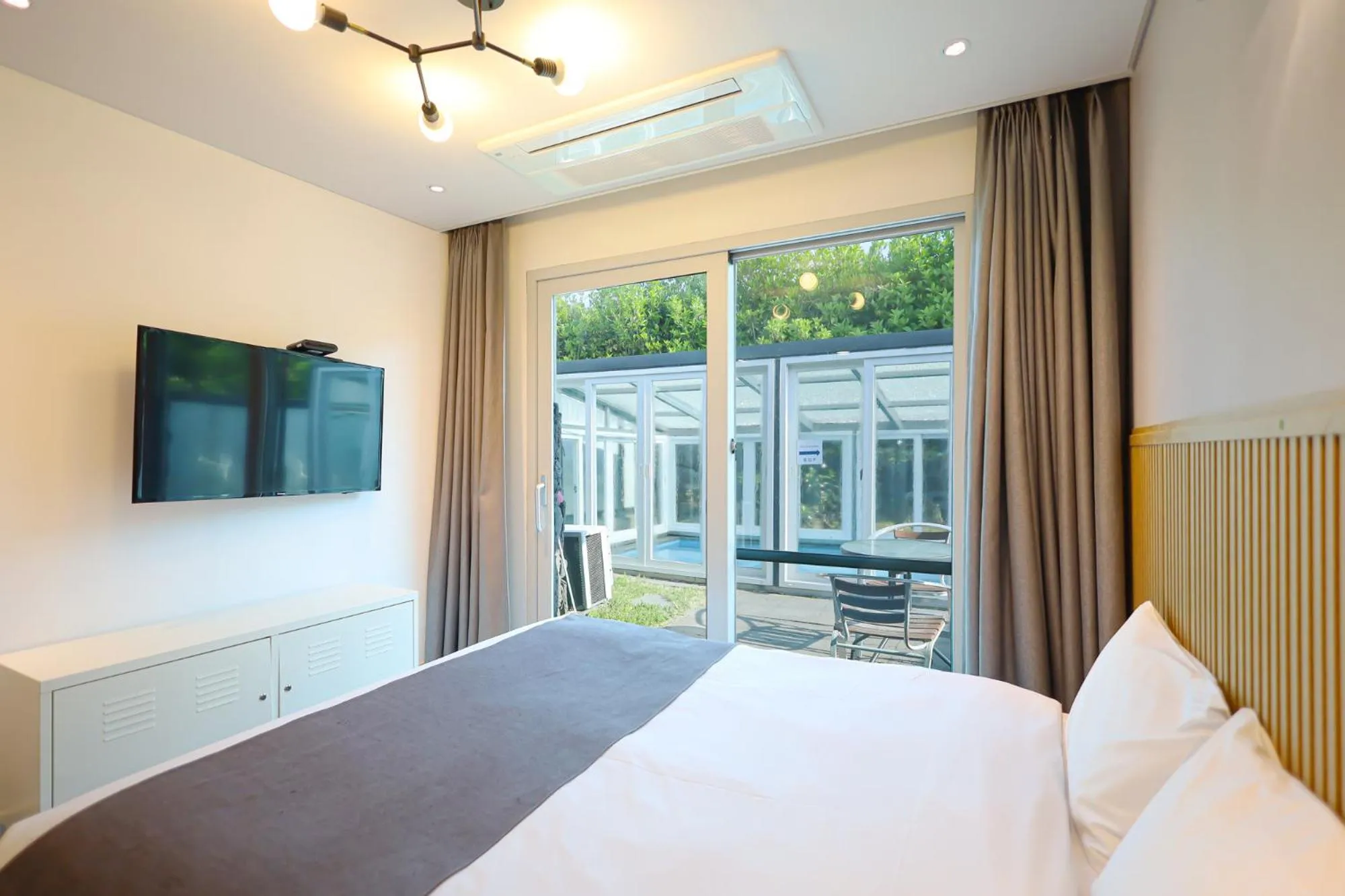 Swimming pool, Bed in Pool and Villa Sorang