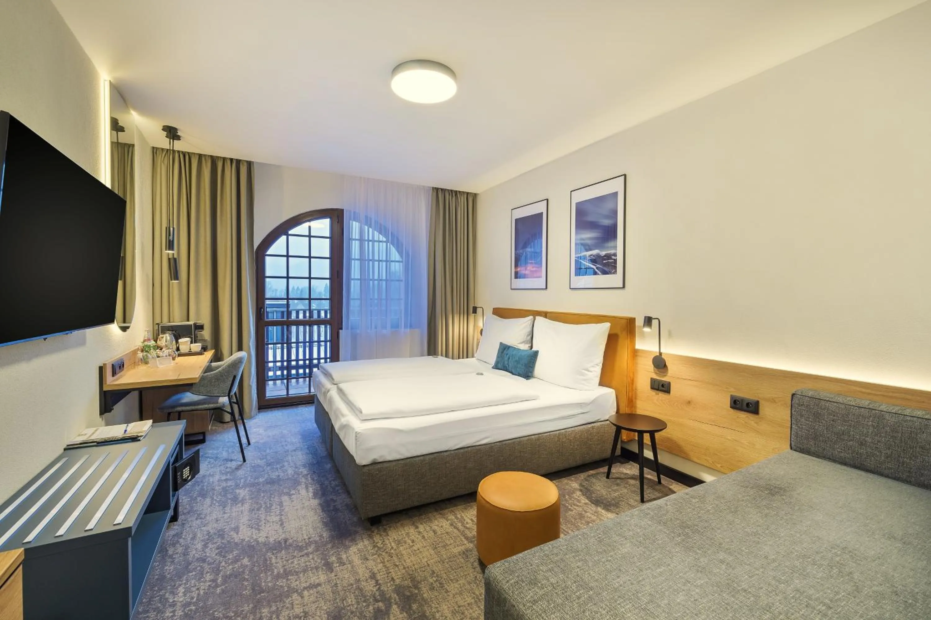 Living room, Bed in Wellness Hotel Windsor