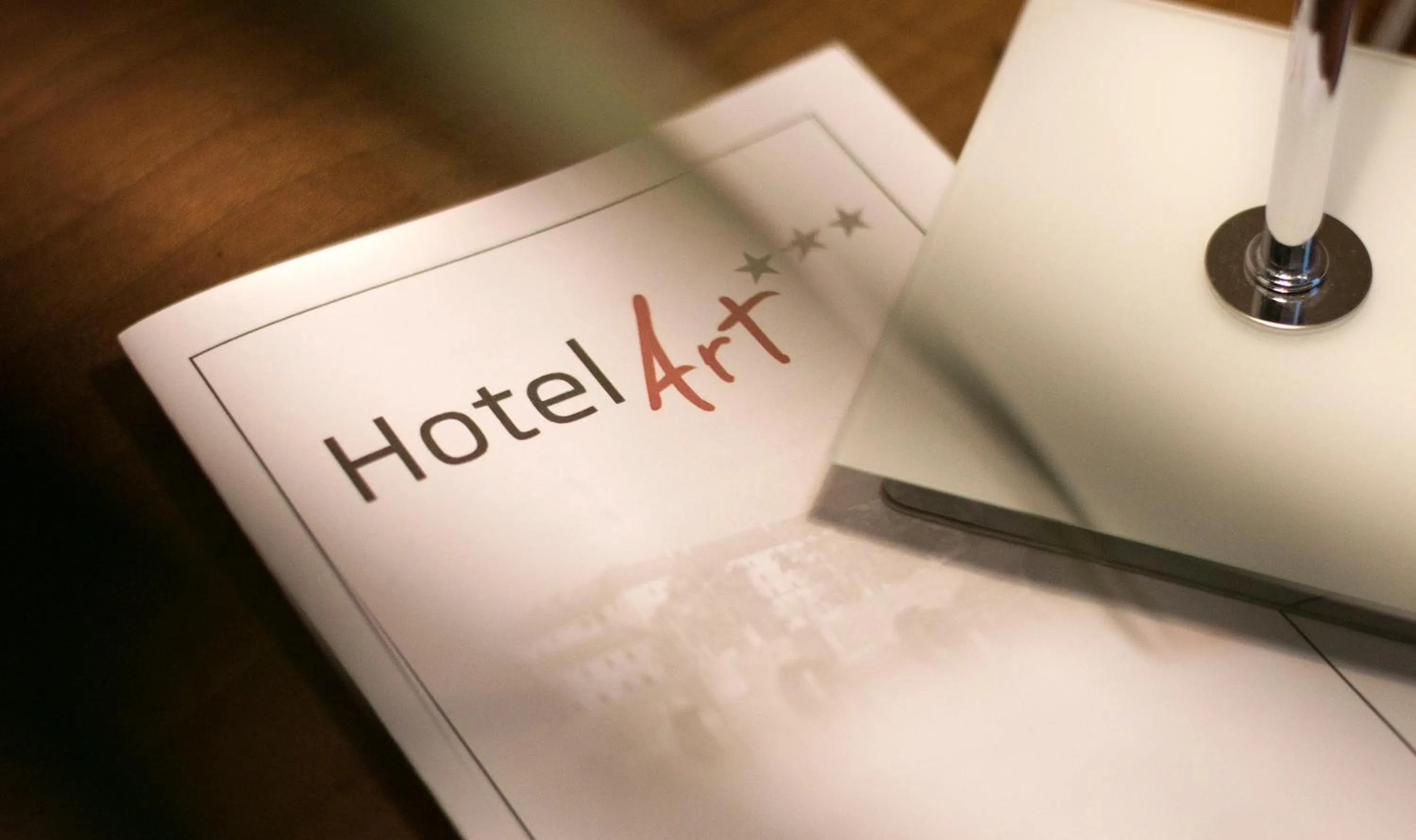 Property logo or sign in Hotel Art