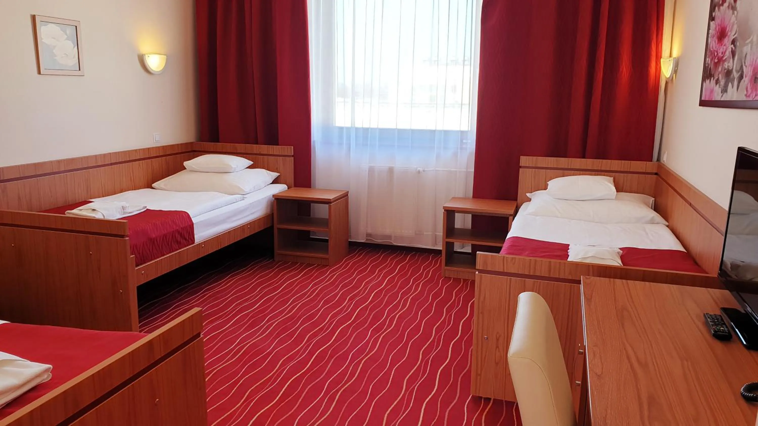 Bed in Diana Club Hotel