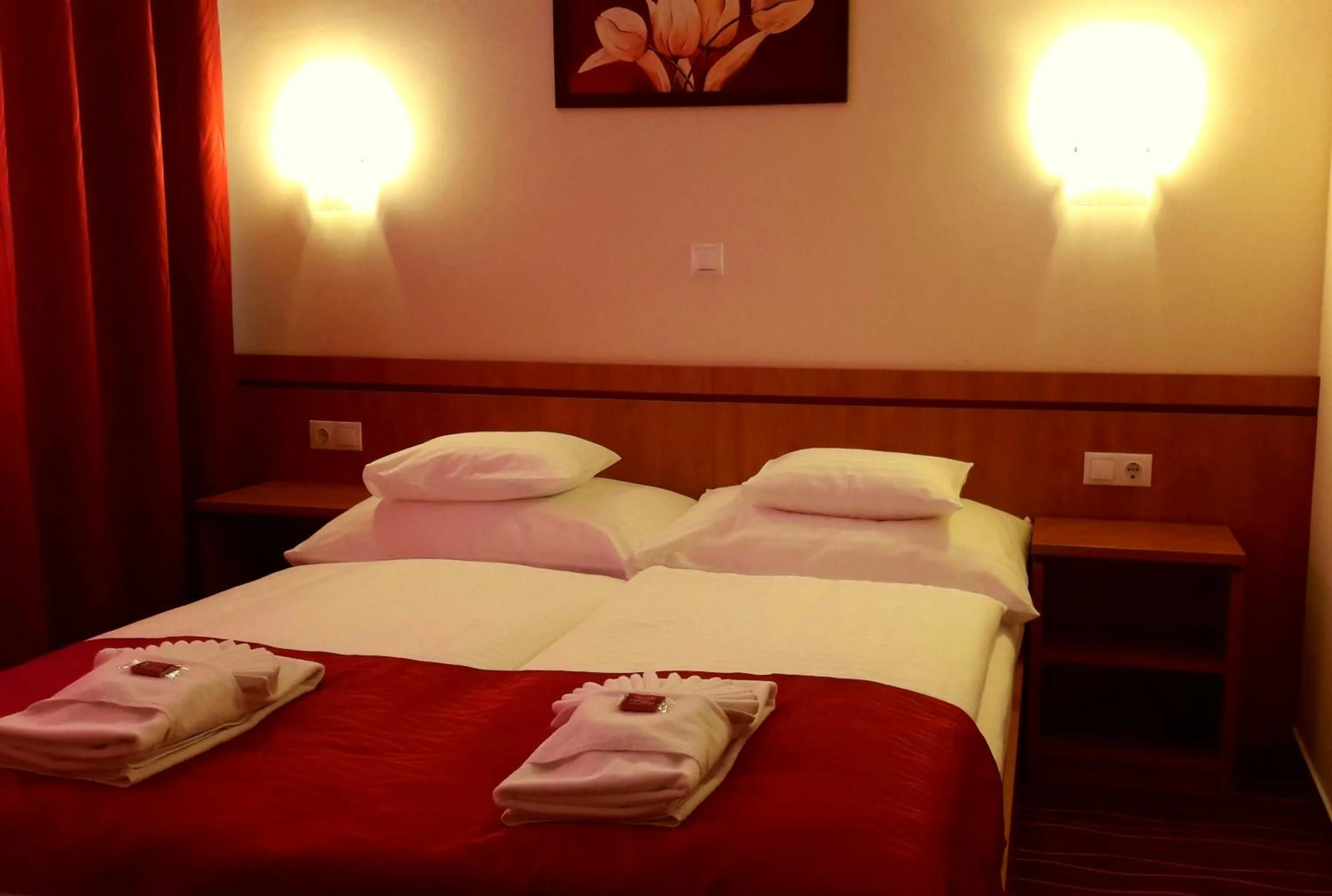 Bed in Diana Club Hotel