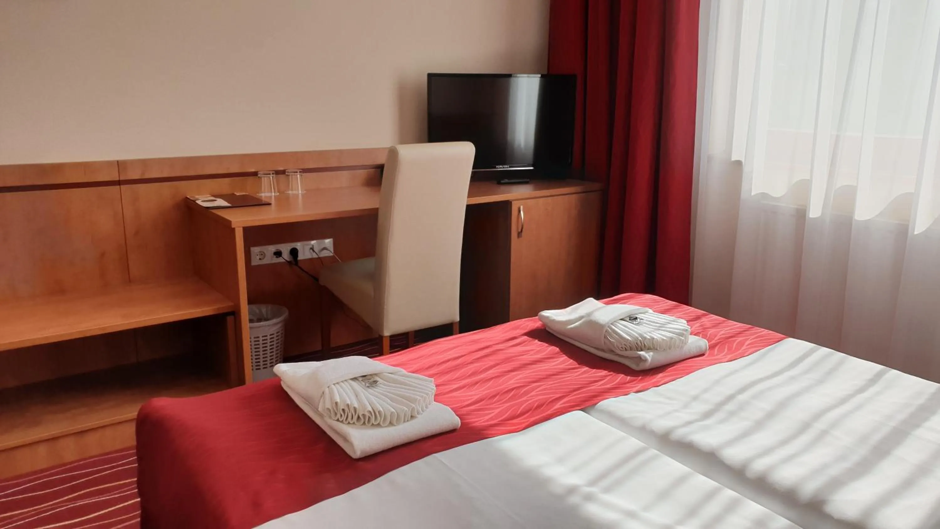 Bed in Diana Club Hotel