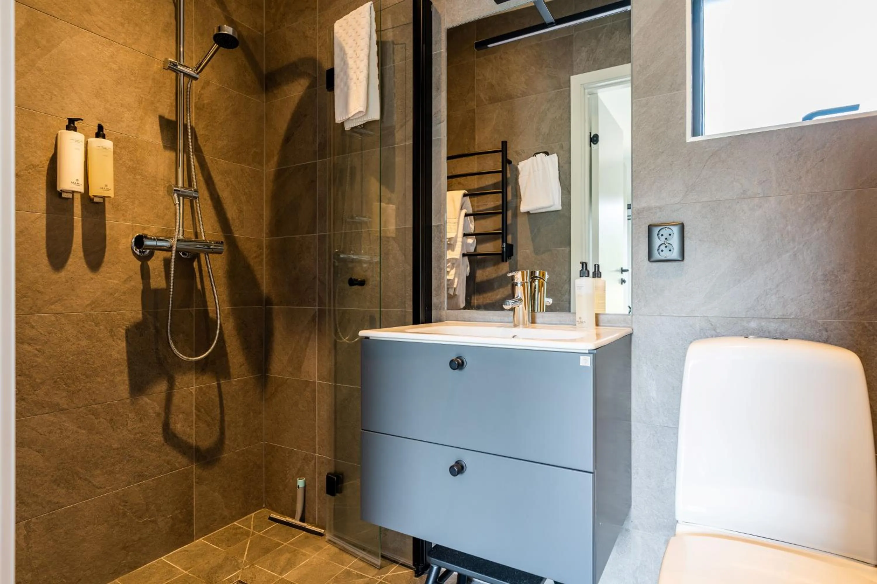 Bathroom in Halmstad Golfarena Hotell & Lägenheter