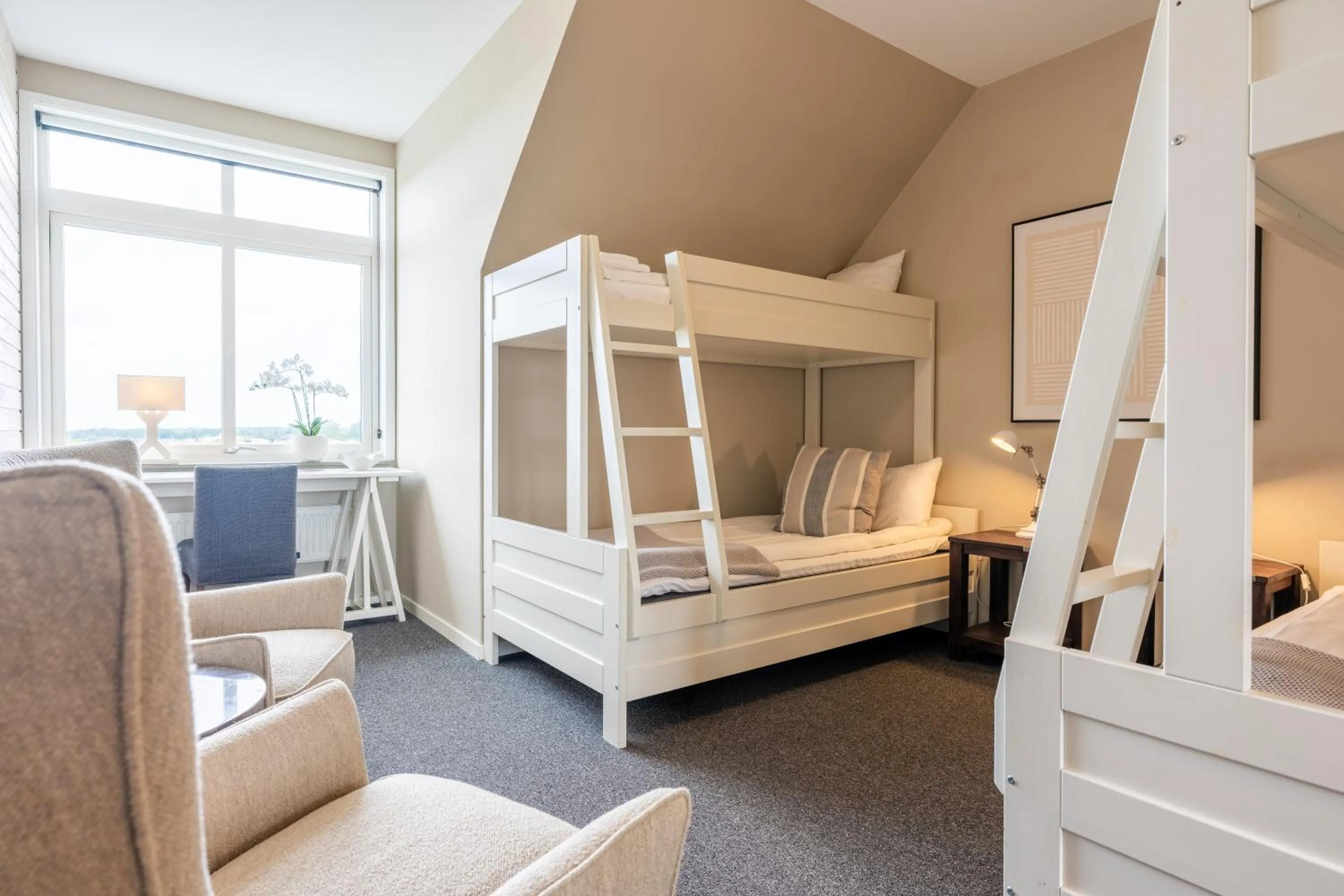 Seating area, Bed in Halmstad Golfarena Hotell & Lägenheter