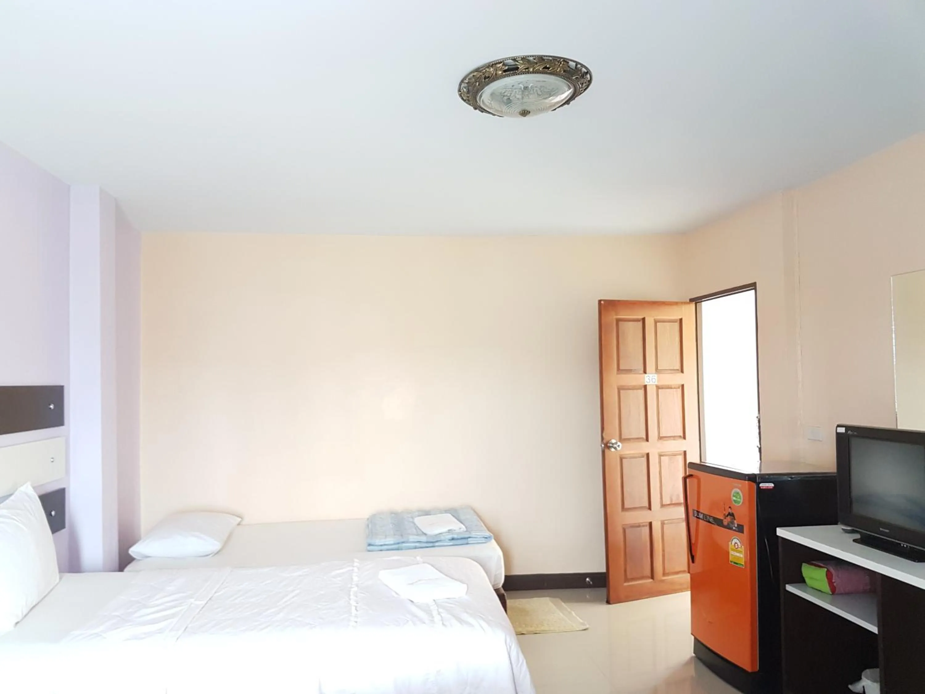 Bed in The Star Villa Resort