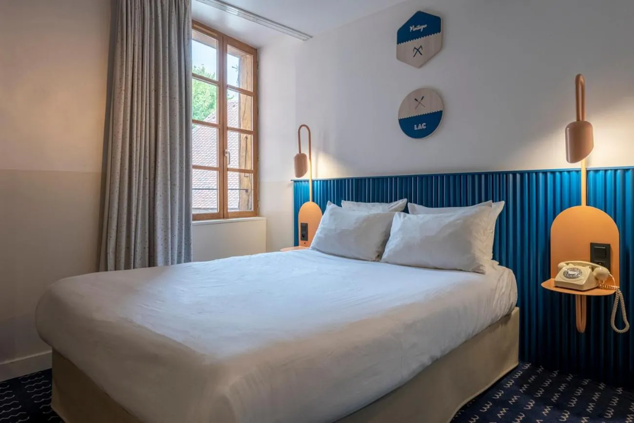 Bed in Hôtel du Palais de l'Isle