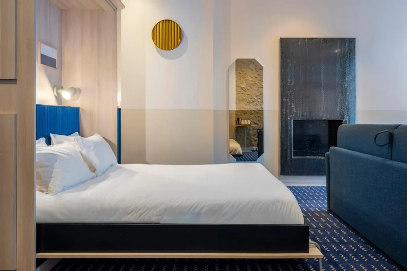 Bed in Hôtel du Palais de l'Isle