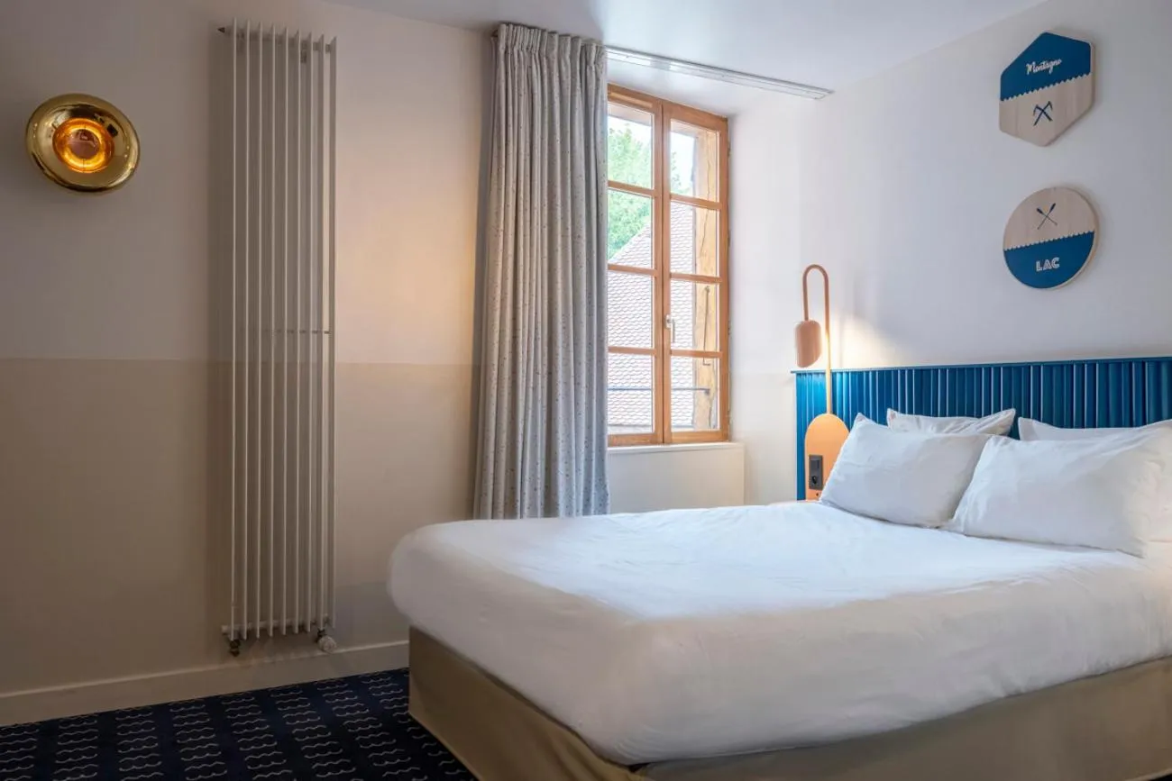 Bed in Hôtel du Palais de l'Isle