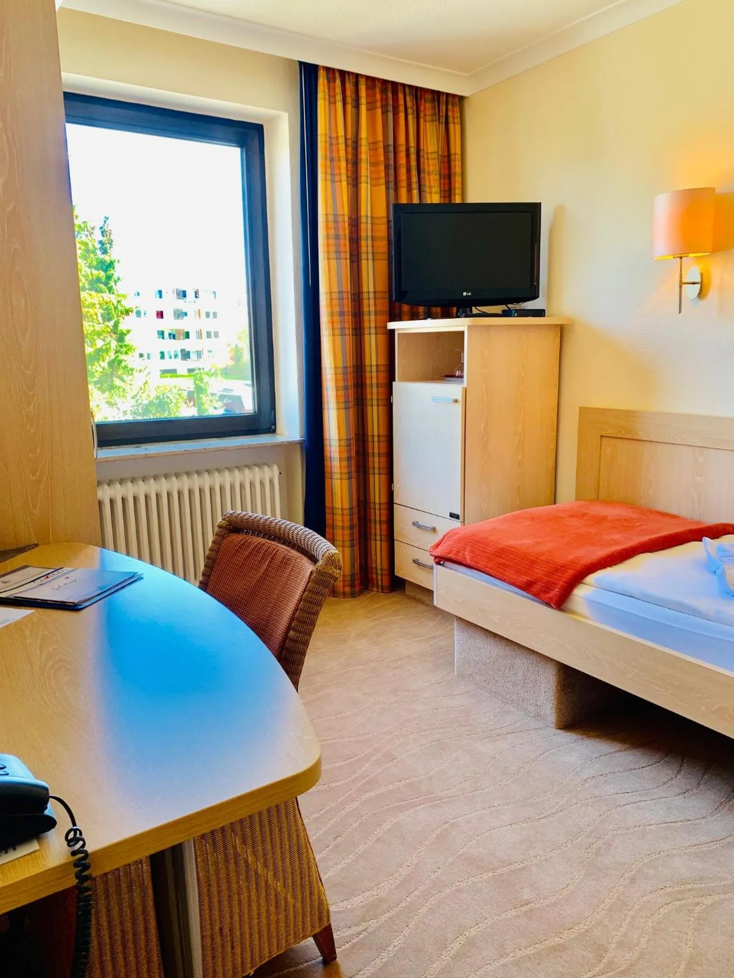 Seating area, Bed in Aparthotel Kleine Perle