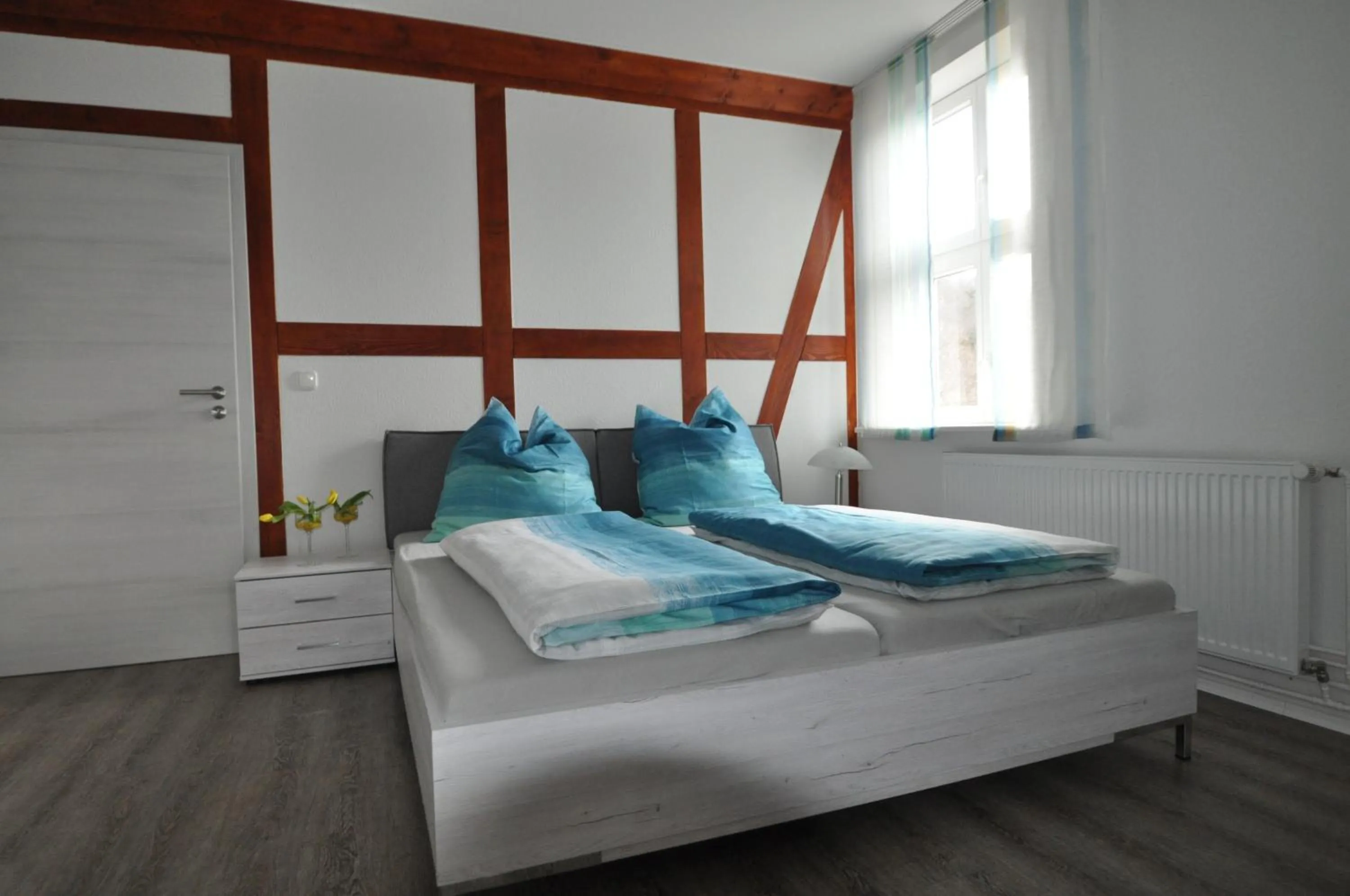 Bedroom, Bed in Gasthaus und Ferienwohnungen "Zum Büchsenmacher"