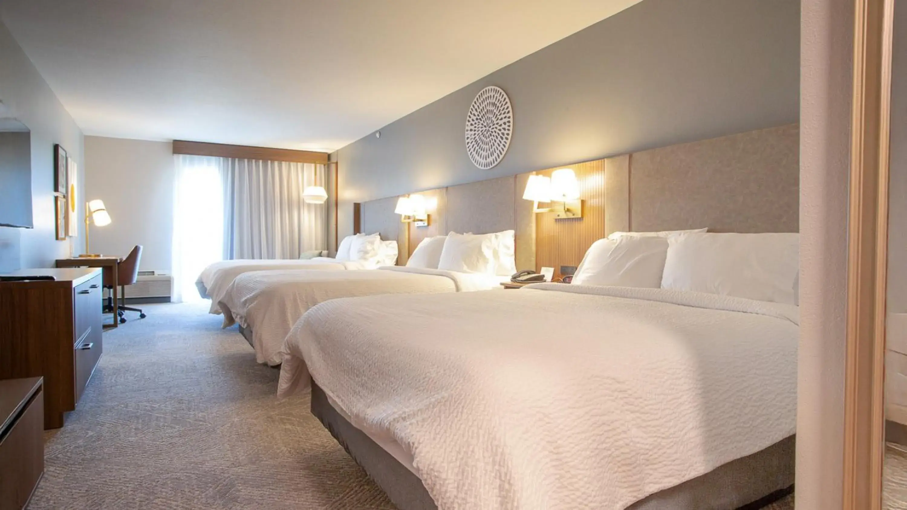 Queen Room with Three Queen Beds in Holiday Inn Midland by IHG Queen Room with Three Queen Beds in Holiday Inn Midland by IHG
