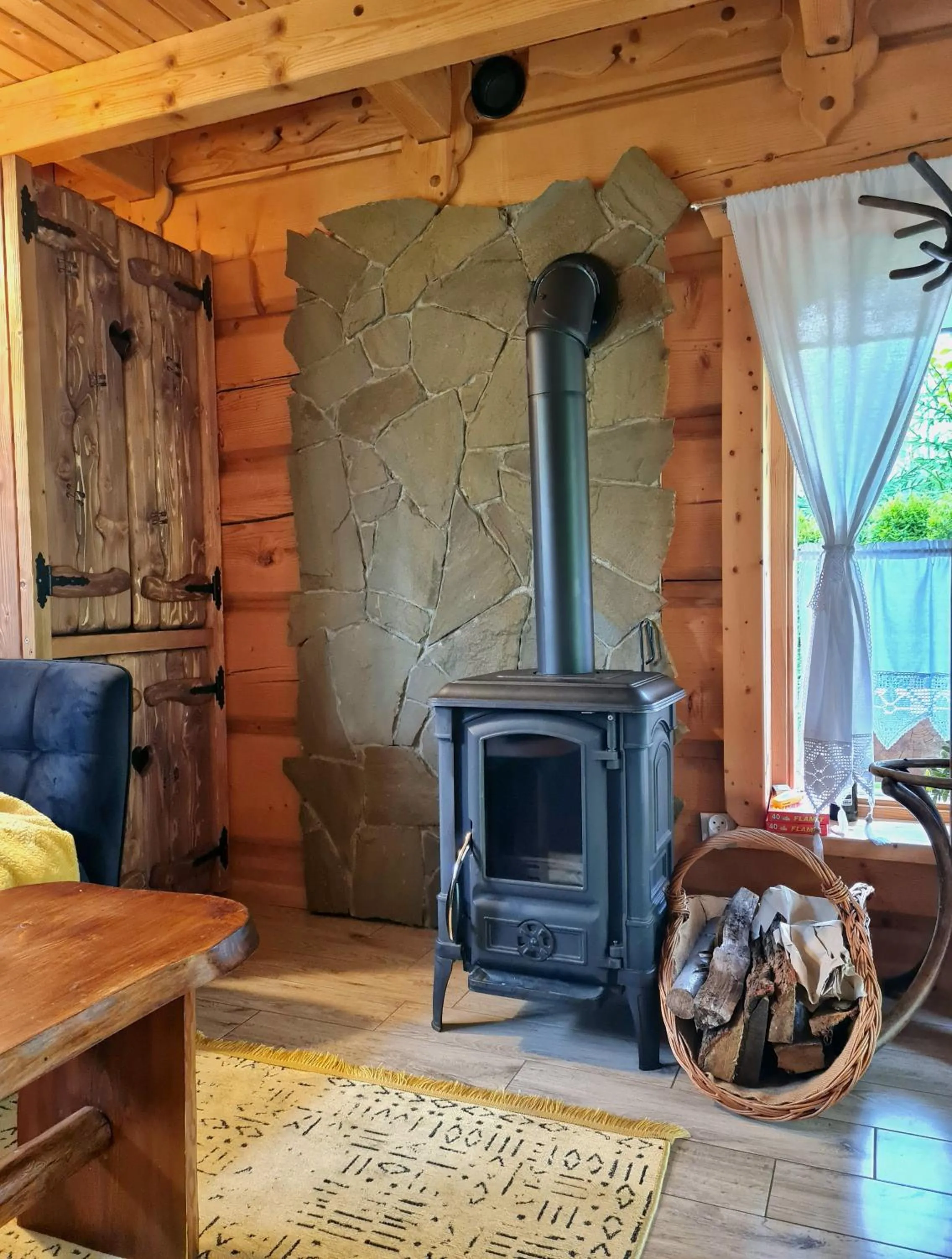 fireplace in Chata w Rabce - Bajkowa Osada