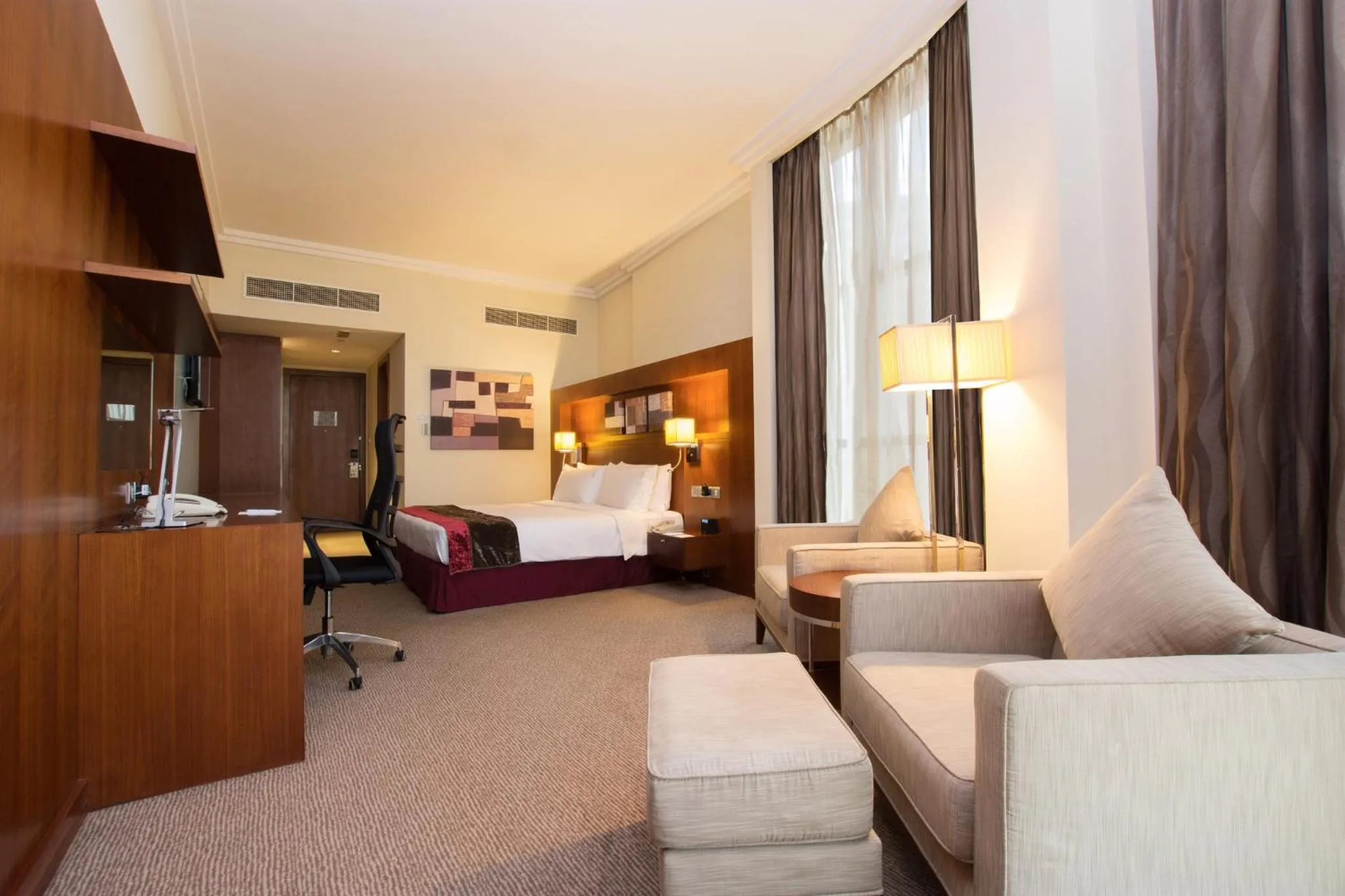Photo of the whole room, Bed in Holiday Inn Abu Dhabi by IHG
