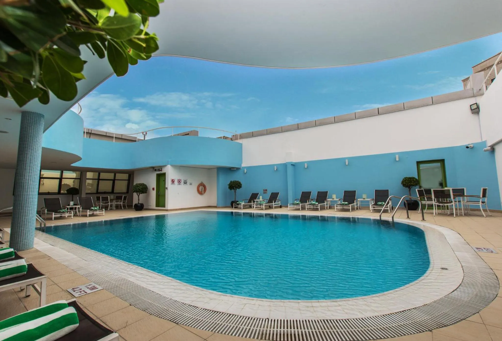 Swimming pool in Holiday Inn Abu Dhabi by IHG