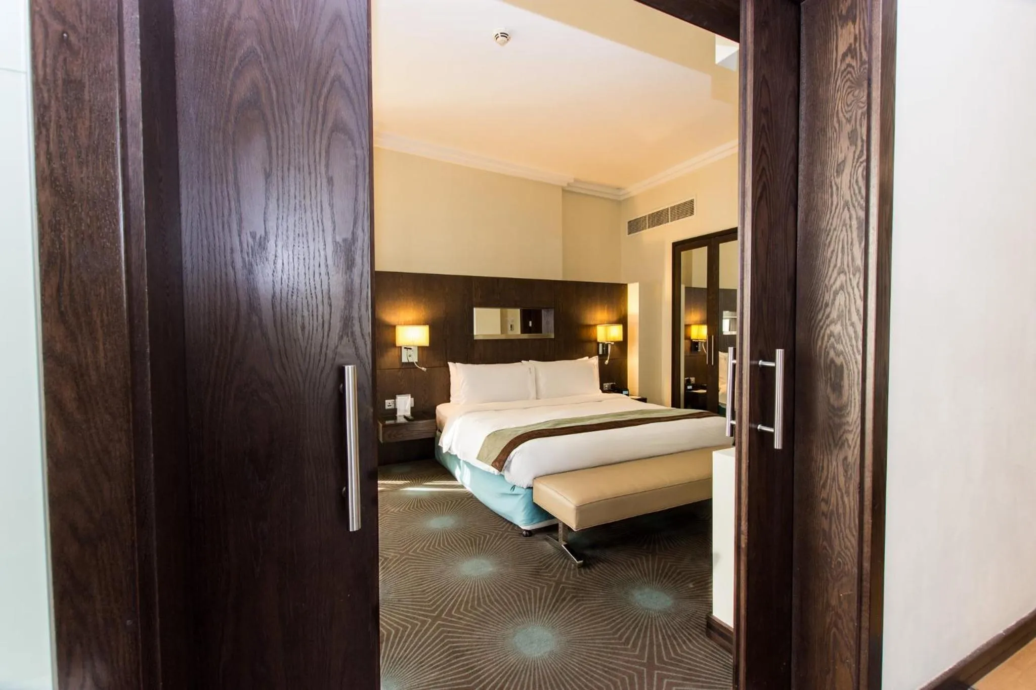 Photo of the whole room, Bed in Holiday Inn Abu Dhabi by IHG