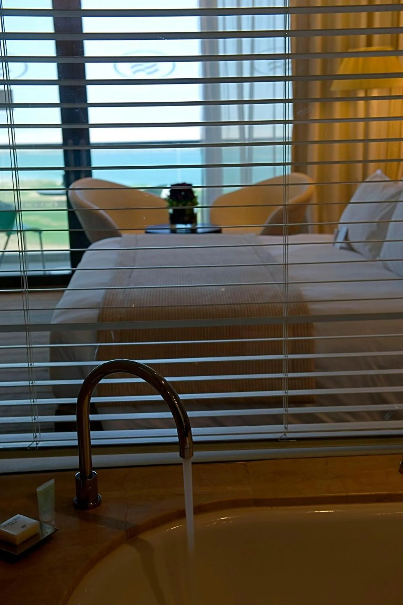 Bathroom, Bed in Crowne Plaza Yas Island by IHG