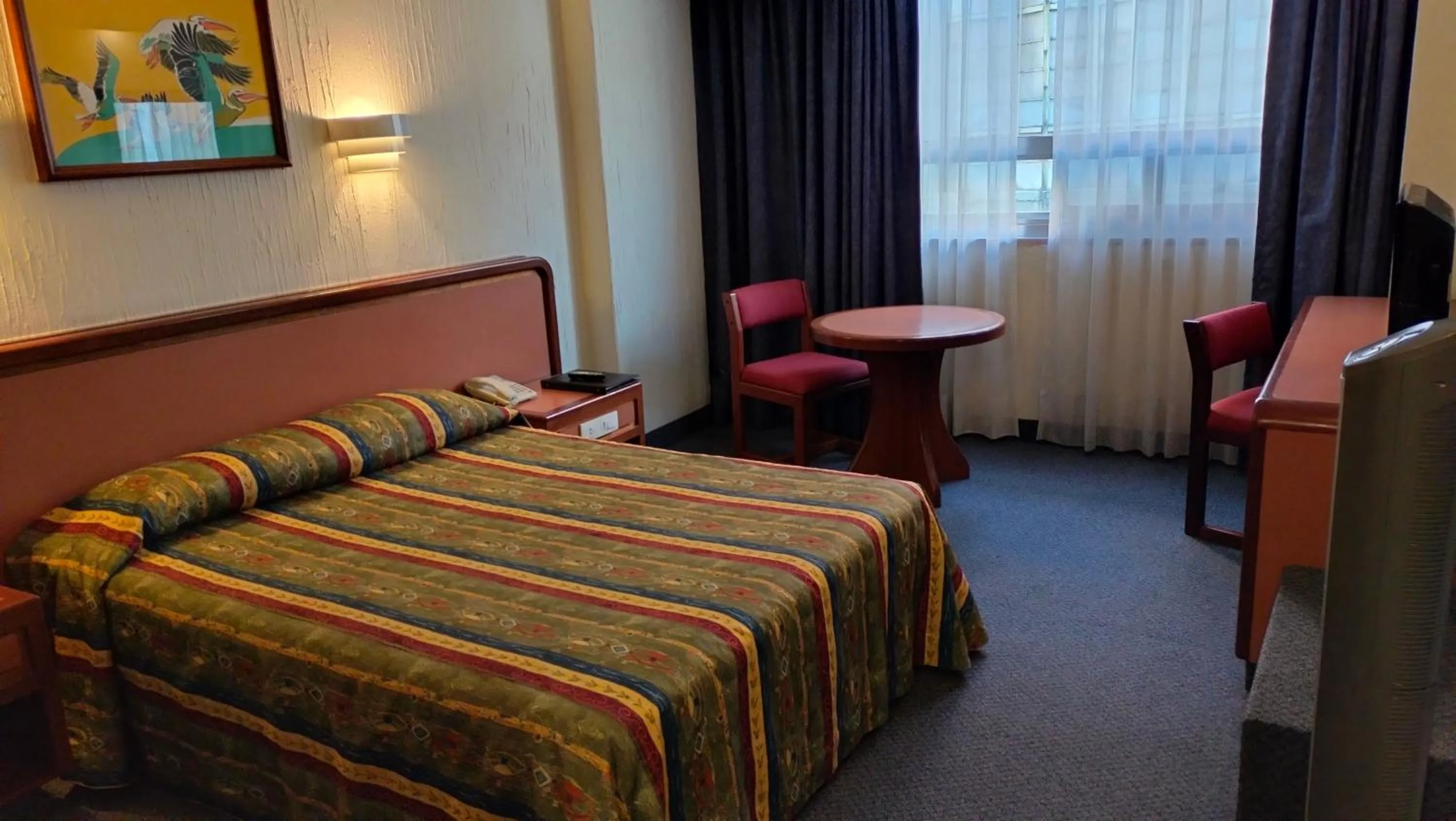 Bed in Hotel Metropol