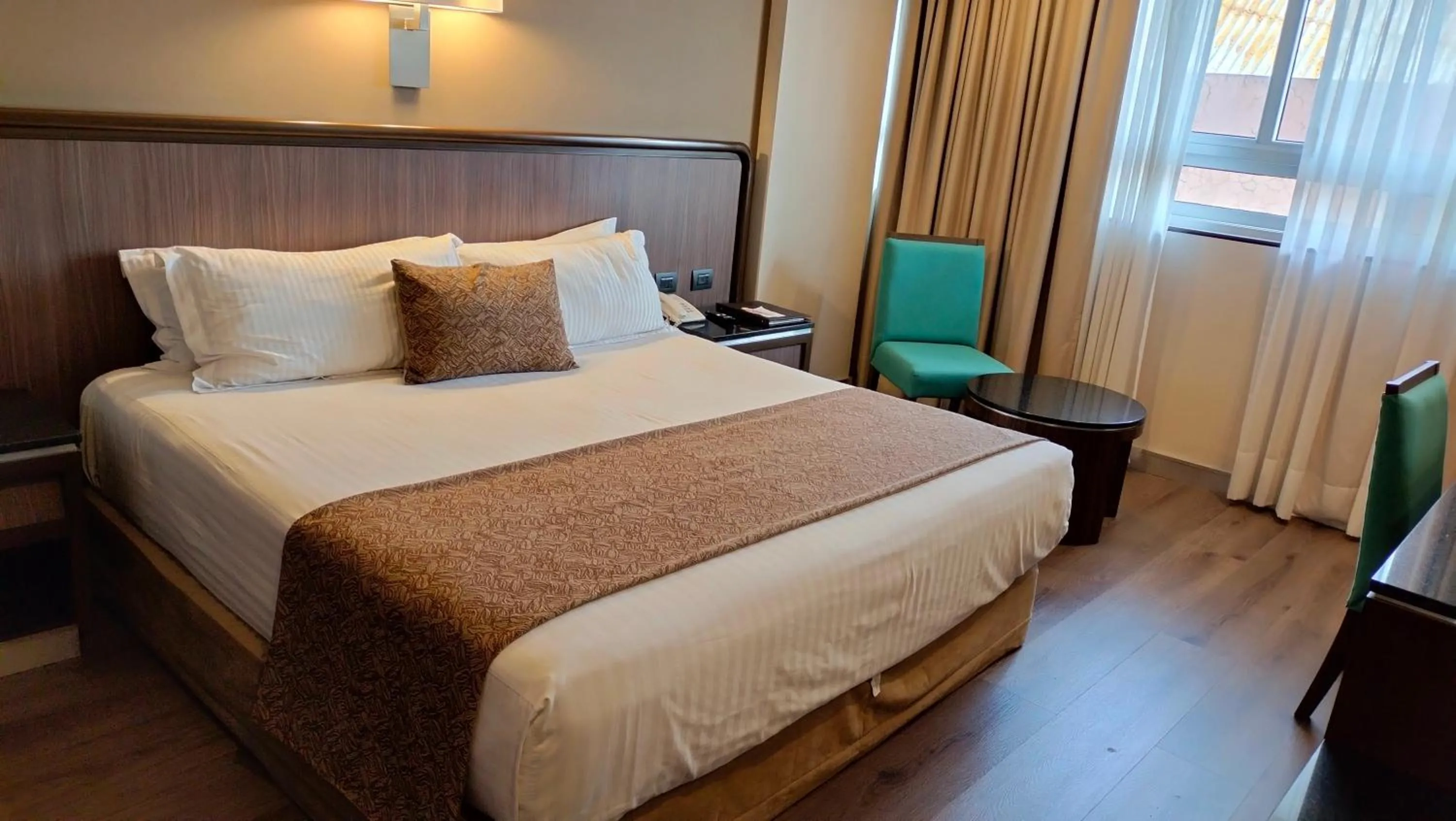 Bed in Hotel Metropol