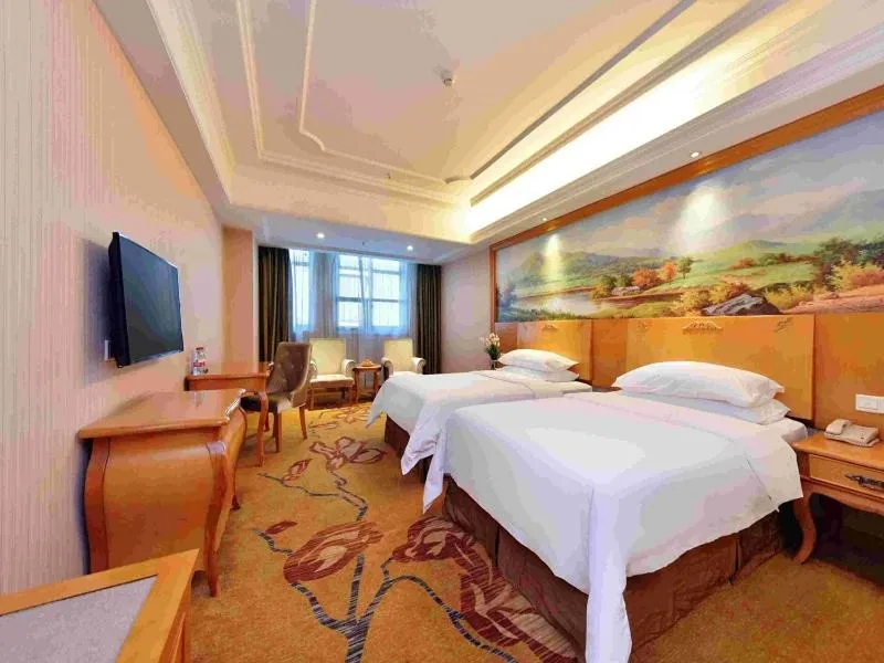 Bed in Vienna International Hotel Zhuzhou Railway Station Central Plaza