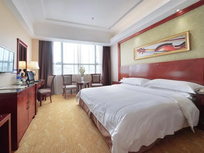Bed in Vienna Hotel Guangzhou Tonghe