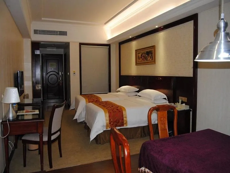 Bed in Vienna Hotel Shanwei Lufeng Jieshi Bus Station