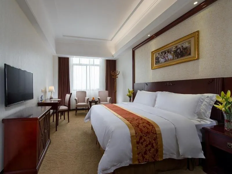 Bed in Vienna Hotel Shanwei Lufeng Jieshi Bus Station