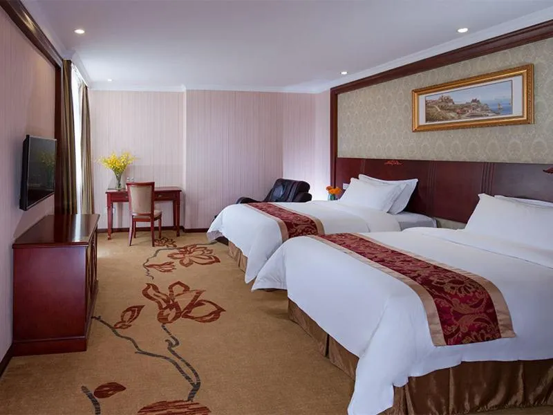 Bed in Vienna Hotel Shenzhen Guanlan Tangren Street