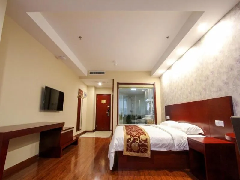Bed in GreenTree Inn Shandong Zaozhuang Tengzhou East Xueyuan Road Guiheyuan Business Hotel