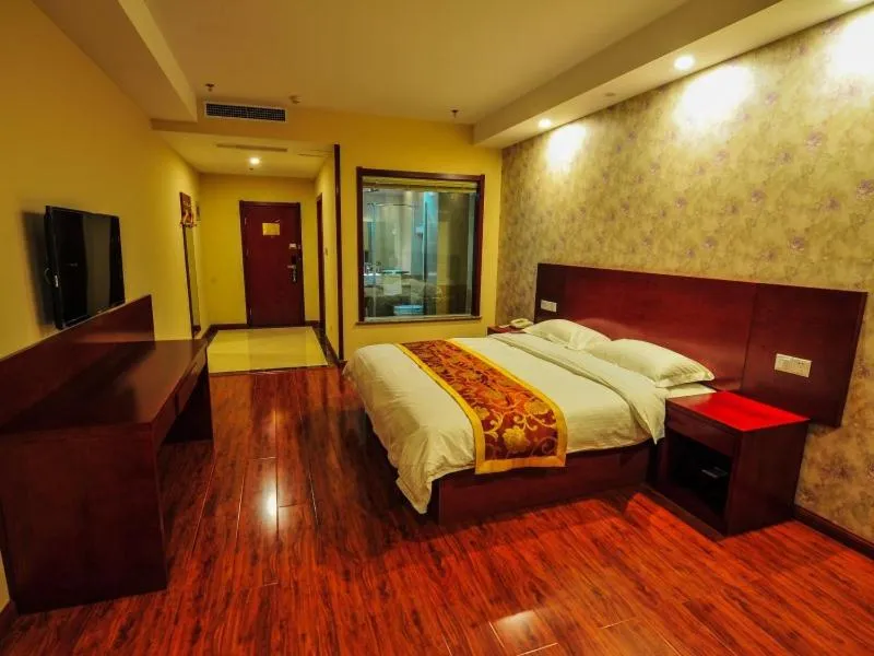 Bed in GreenTree Inn Shandong Zaozhuang Tengzhou East Xueyuan Road Guiheyuan Business Hotel