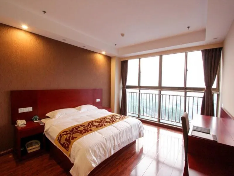Bed in GreenTree Inn Shandong Zaozhuang Tengzhou East Xueyuan Road Guiheyuan Business Hotel