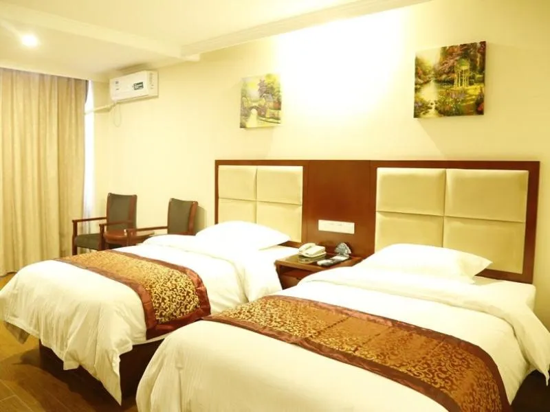 Bed in Greentree Tangshan Nanhu Jindi Business Hotel