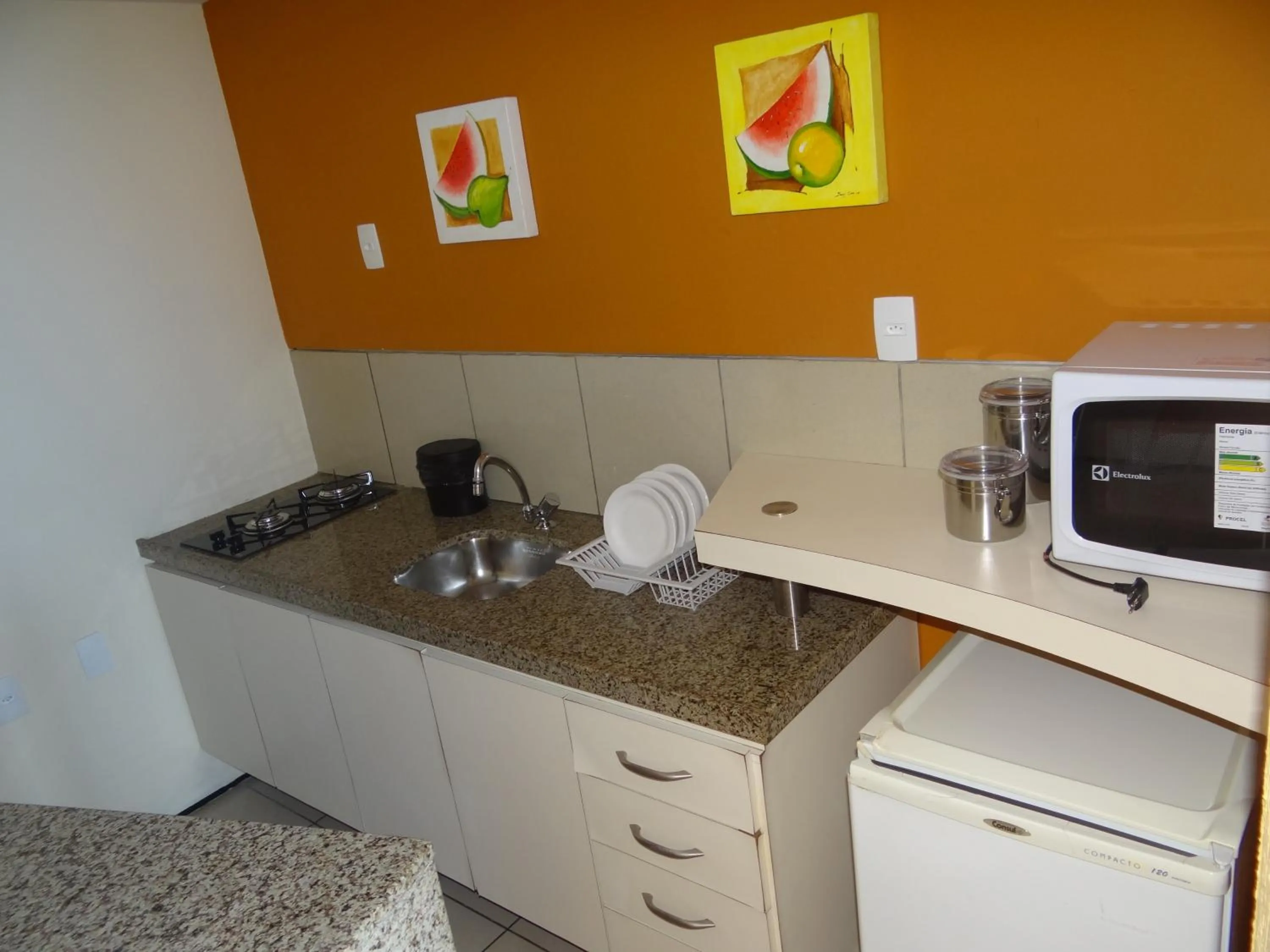 Communal kitchen in Apartamento Em Andar Alto com Vista Mar Meireles