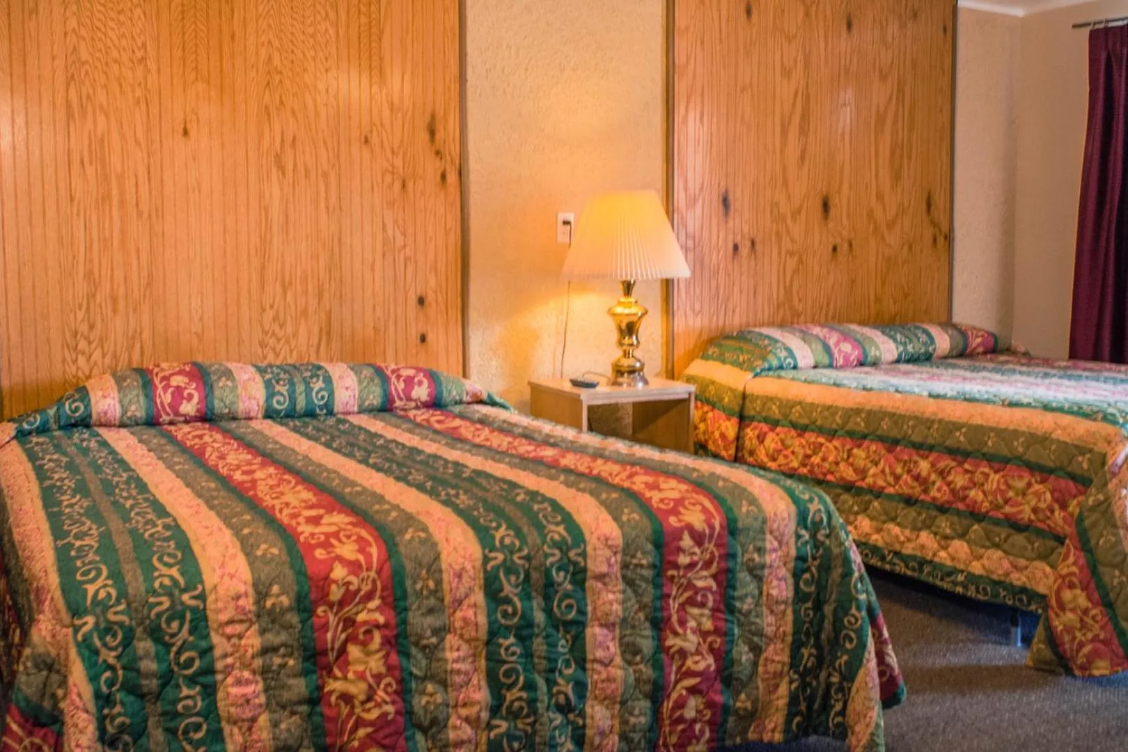 Photo of the whole room in Sun -N- Sand Motel