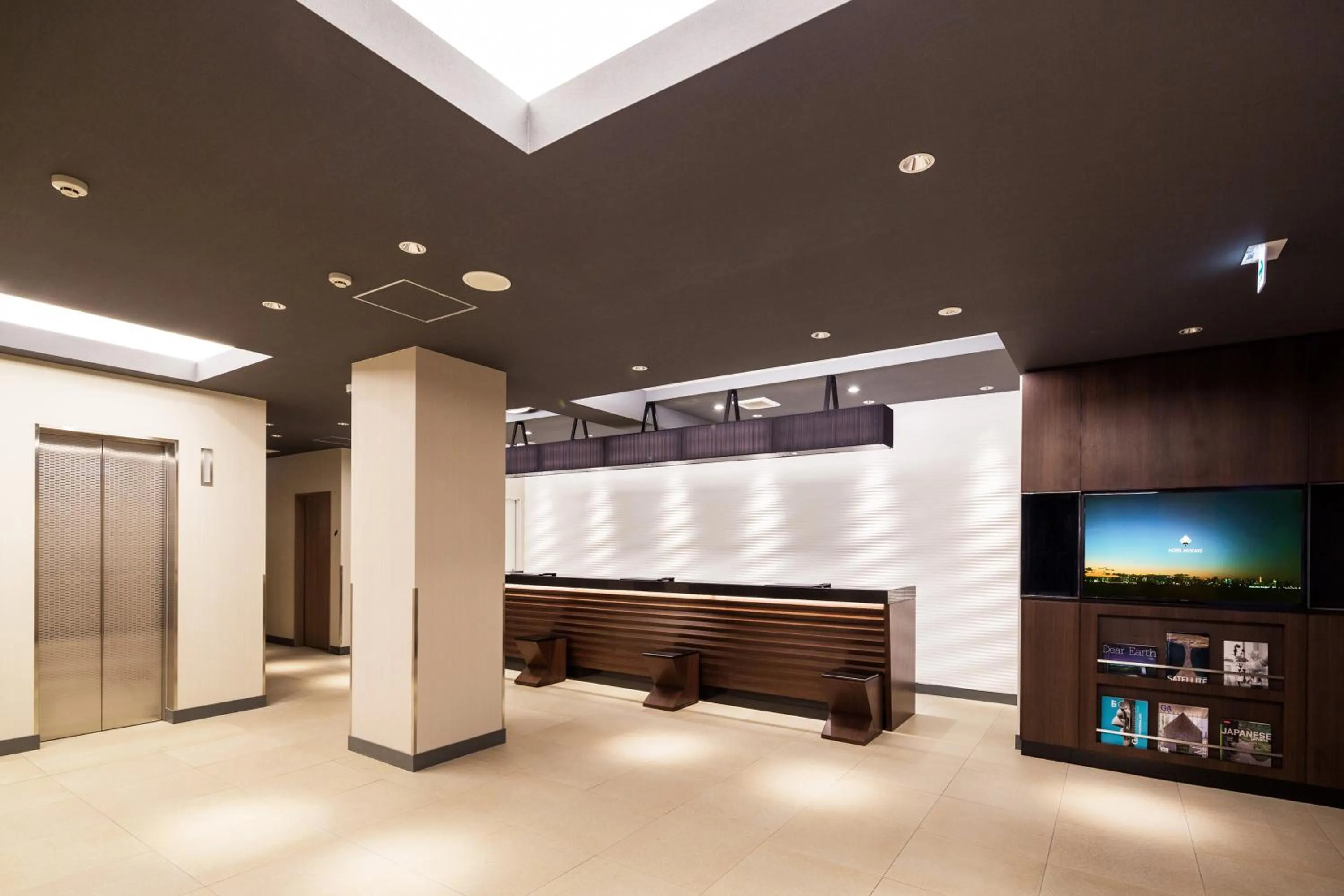 Lobby or reception in HOTEL MYSTAYS Yokohama Kannai