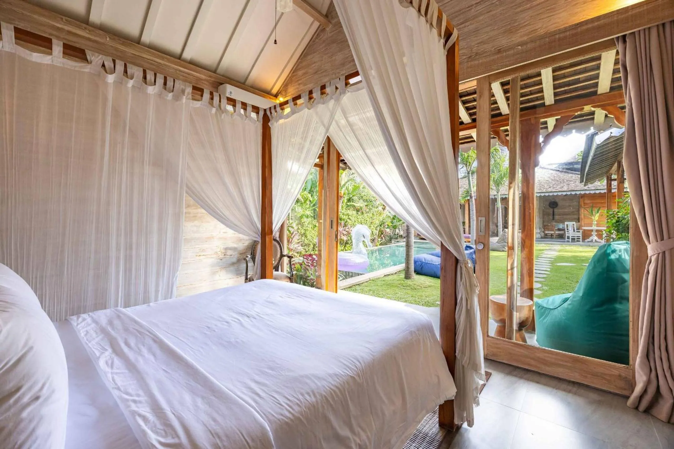 Bed in Villa Du Bah - Cozy Tropical 3BR Villa 12min To Beach