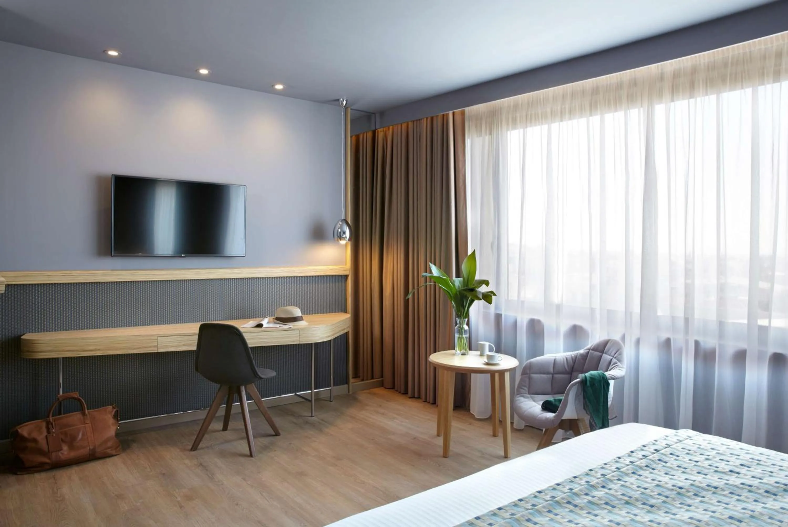 Photo of the whole room, Bed in Zeus Wyndham Grand Athens